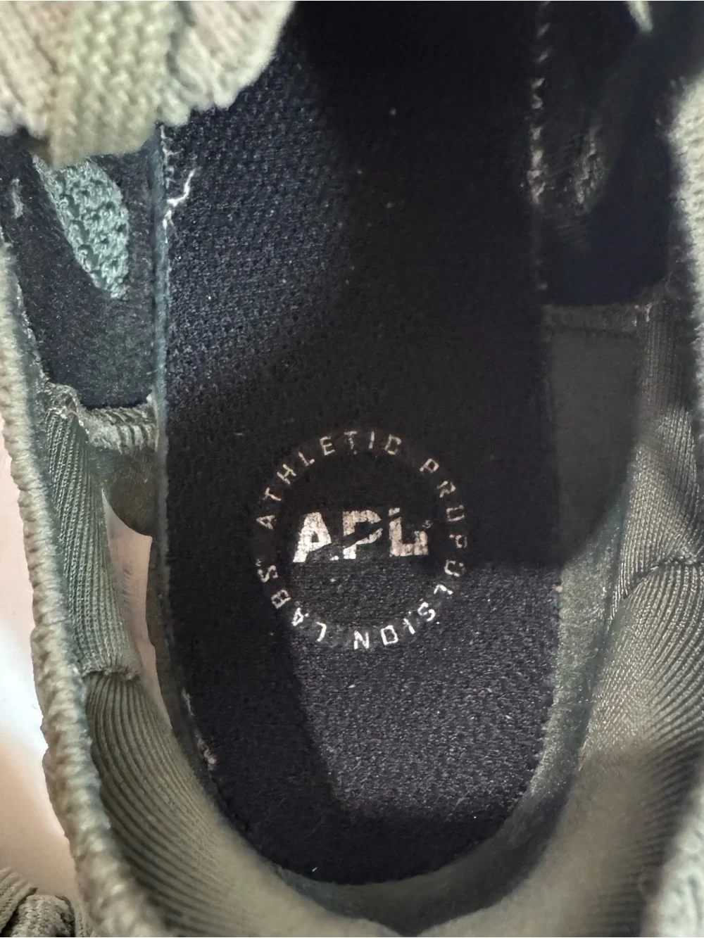 APL women’s TechLoom Knit Sneakers in Olive green
